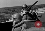 Image of landing boats United States USA, 1944, second 49 stock footage video 65675077220