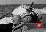 Image of landing boats United States USA, 1944, second 50 stock footage video 65675077220