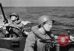 Image of landing boats United States USA, 1944, second 51 stock footage video 65675077220