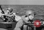 Image of landing boats United States USA, 1944, second 52 stock footage video 65675077220