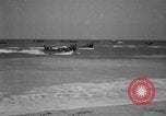 Image of landing boats United States USA, 1944, second 32 stock footage video 65675077223