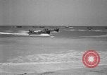 Image of landing boats United States USA, 1944, second 33 stock footage video 65675077223