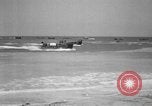 Image of landing boats United States USA, 1944, second 34 stock footage video 65675077223