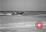 Image of landing boats United States USA, 1944, second 35 stock footage video 65675077223