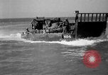 Image of landing boats United States USA, 1944, second 36 stock footage video 65675077223