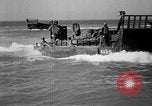 Image of landing boats United States USA, 1944, second 37 stock footage video 65675077223