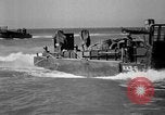 Image of landing boats United States USA, 1944, second 38 stock footage video 65675077223