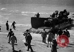 Image of landing boats United States USA, 1944, second 41 stock footage video 65675077223