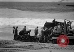 Image of landing boats United States USA, 1944, second 43 stock footage video 65675077223