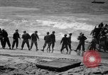 Image of landing boats United States USA, 1944, second 46 stock footage video 65675077223