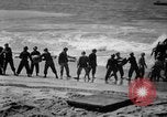 Image of landing boats United States USA, 1944, second 47 stock footage video 65675077223