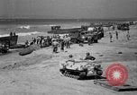 Image of landing boats United States USA, 1944, second 50 stock footage video 65675077223