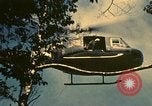 Standbild UH-1 Iroquois Hubschrauber United States USA, 1970, aus Sekunde 59 historischem Filmmaterial Videoclip 65675077311