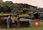 Image of UH-1 Iroquois helicopter extricate combat team United States USA, 1970, second 12 stock footage video 65675077321