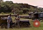 Image of UH-1 Iroquois helicopter extricate combat team United States USA, 1970, second 15 stock footage video 65675077321