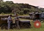 Image of UH-1 Iroquois helicopter extricate combat team United States USA, 1970, second 17 stock footage video 65675077321