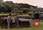 Image of UH-1 Iroquois helicopter extricate combat team United States USA, 1970, second 18 stock footage video 65675077321