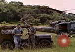 Image of UH-1 Iroquois helicopter extricate combat team United States USA, 1970, second 19 stock footage video 65675077321