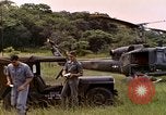 Image of UH-1 Iroquois helicopter extricate combat team United States USA, 1970, second 20 stock footage video 65675077321