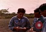 Image of UH-1 Iroquois helicopter extricate combat team United States USA, 1970, second 24 stock footage video 65675077321