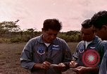 Image of UH-1 Iroquois helicopter extricate combat team United States USA, 1970, second 26 stock footage video 65675077321
