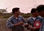 Image of UH-1 Iroquois helicopter extricate combat team United States USA, 1970, second 27 stock footage video 65675077321