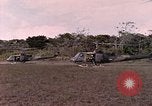 Image of UH-1 Iroquois helicopter extricate combat team United States USA, 1970, second 30 stock footage video 65675077321