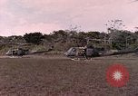 Image of UH-1 Iroquois helicopter extricate combat team United States USA, 1970, second 31 stock footage video 65675077321