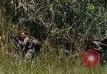 Image of UH-1 Iroquois helicopter extricate combat team United States USA, 1970, second 57 stock footage video 65675077321