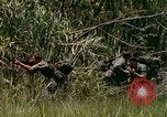Image of UH-1 Iroquois helicopter extricate combat team United States USA, 1970, second 62 stock footage video 65675077321