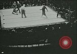Image of boxing bout New York City USA, 1930, second 1 stock footage video 65675077340