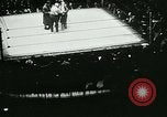 Image of boxing bout New York City USA, 1930, second 3 stock footage video 65675077340