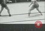 Image of boxing bout New York City USA, 1930, second 8 stock footage video 65675077340