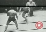 Image of boxing bout New York City USA, 1930, second 10 stock footage video 65675077340
