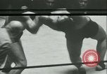 Image of boxing bout New York City USA, 1930, second 15 stock footage video 65675077340