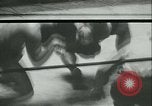 Image of boxing bout New York City USA, 1930, second 17 stock footage video 65675077340