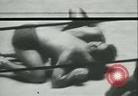 Image of boxing bout New York City USA, 1930, second 18 stock footage video 65675077340