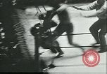 Image of boxing bout New York City USA, 1930, second 43 stock footage video 65675077340