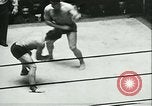Image of boxing bout New York City USA, 1930, second 51 stock footage video 65675077340