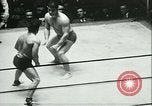 Image of boxing bout New York City USA, 1930, second 52 stock footage video 65675077340