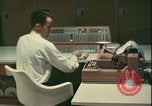 Image of early model computer use in banking United States USA, 1961, second 1 stock footage video 65675077348
