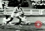 Image of Jesse Owens wins the 100 meter dash Berlin Germany, 1936, second 60 stock footage video 65675077353
