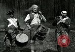 Image of Revolutionary reenactor drummers and fife player United States USA, 1916, second 17 stock footage video 65675077372