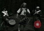 Image of Revolutionary reenactor drummers and fife player United States USA, 1916, second 23 stock footage video 65675077372