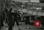 Image of US Navy recruits sleeping in hammocks in barracks Great Lakes Illinois USA, 1917, second 12 stock footage video 65675077387