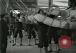 Image of US Navy recruits sleeping in hammocks in barracks Great Lakes Illinois USA, 1917, second 21 stock footage video 65675077387