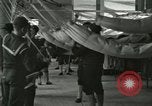 Image of US Navy recruits sleeping in hammocks in barracks Great Lakes Illinois USA, 1917, second 27 stock footage video 65675077387