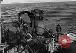 Immagine di USS Burton Island prendendo su apparecchiature Gulf of Alaska USA, 1952, secondo 47 filmato di repertorio 65675077433