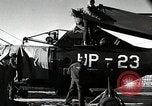 Immagine di USS Burton Island prendendo su apparecchiature Gulf of Alaska USA, 1952, secondo 52 filmato di repertorio 65675077433