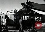 Immagine di USS Burton Island prendendo su apparecchiature Gulf of Alaska USA, 1952, secondo 54 filmato di repertorio 65675077433